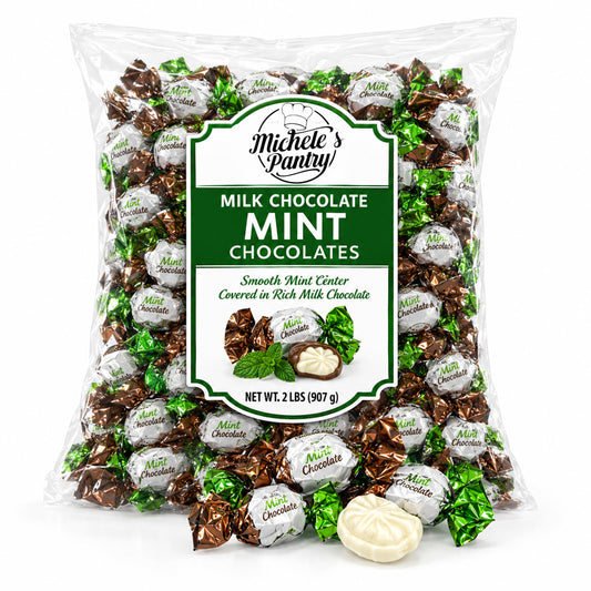 A 2 lb bag of Michele's Pantry Milk Chocolate Mint Chocolates, showing the clear packaging filled with individually wrapped chocolates and a few unwrapped mint chocolates in front on a white background.