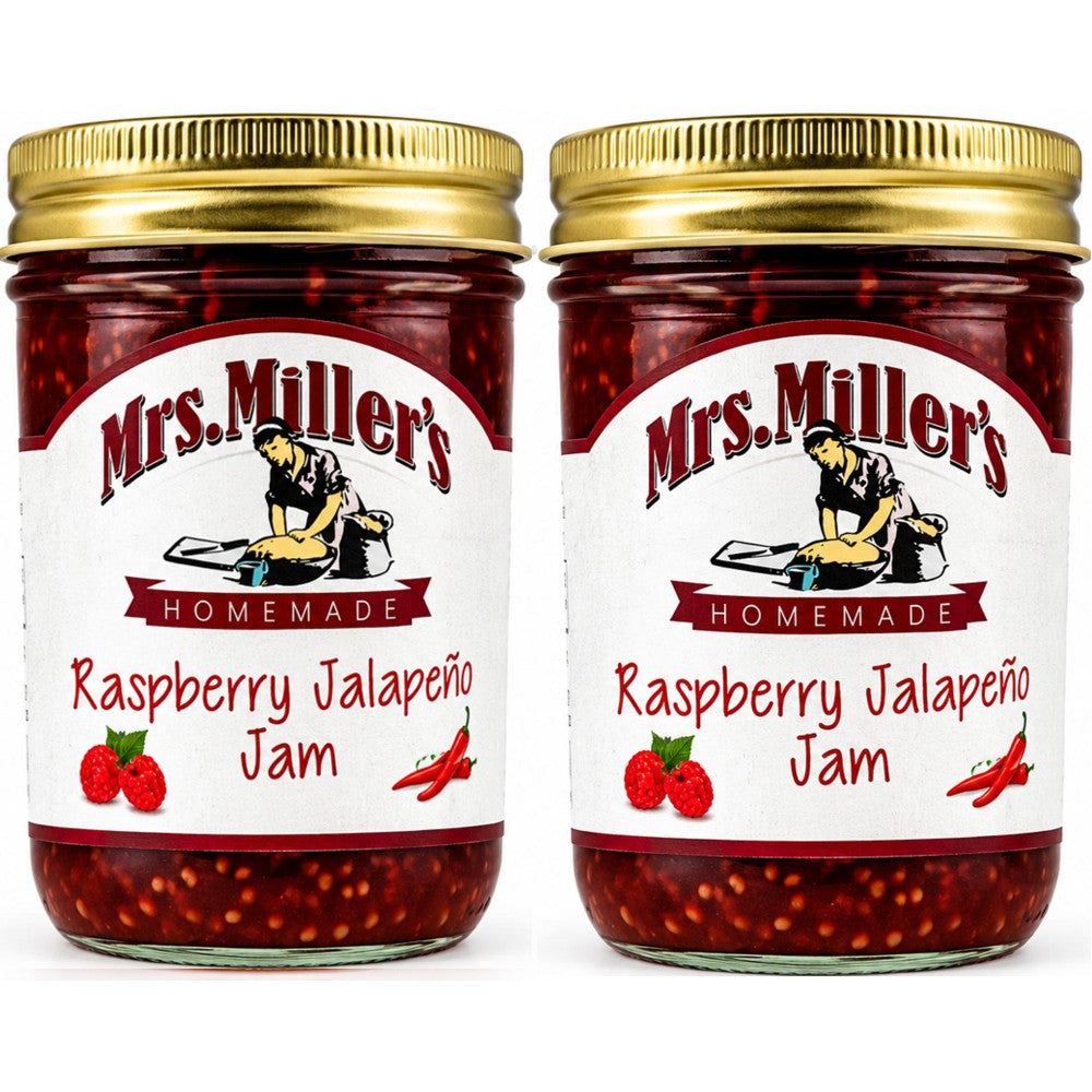Two clear glass jars of Mrs. Miller's Homemade Raspberry Jalapeño Jam with gold metal lids are displayed side-by-side on a white background.